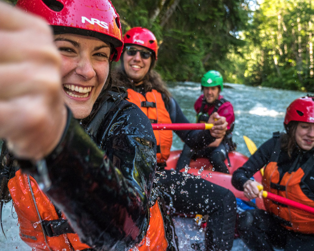 Friends whitewater rafting in Whistler