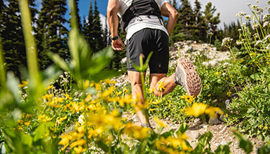 Person trail running in the alpine in Whistler BC