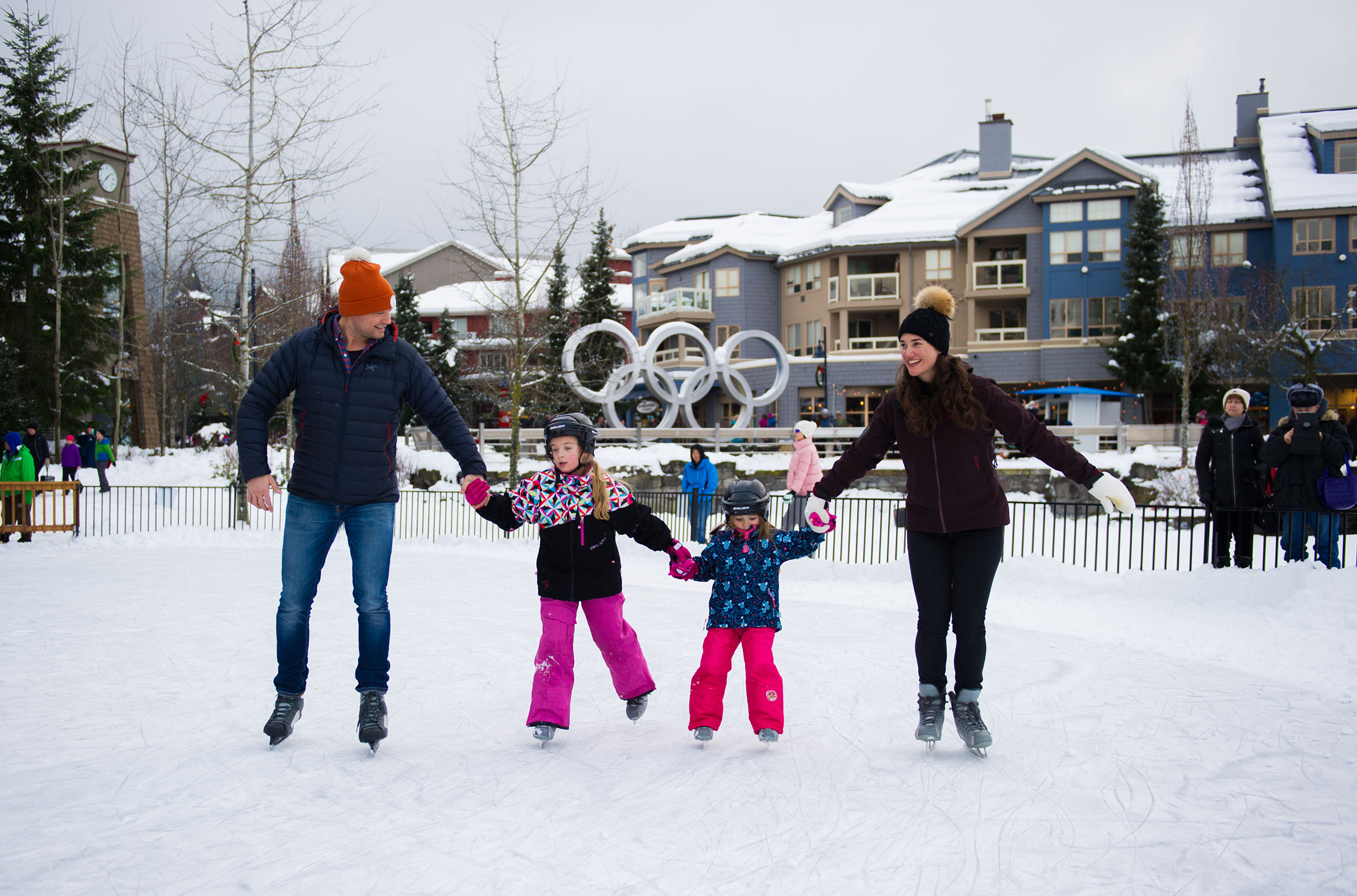 A family skate at the ice rink at Whistler's Olympic Plaza.