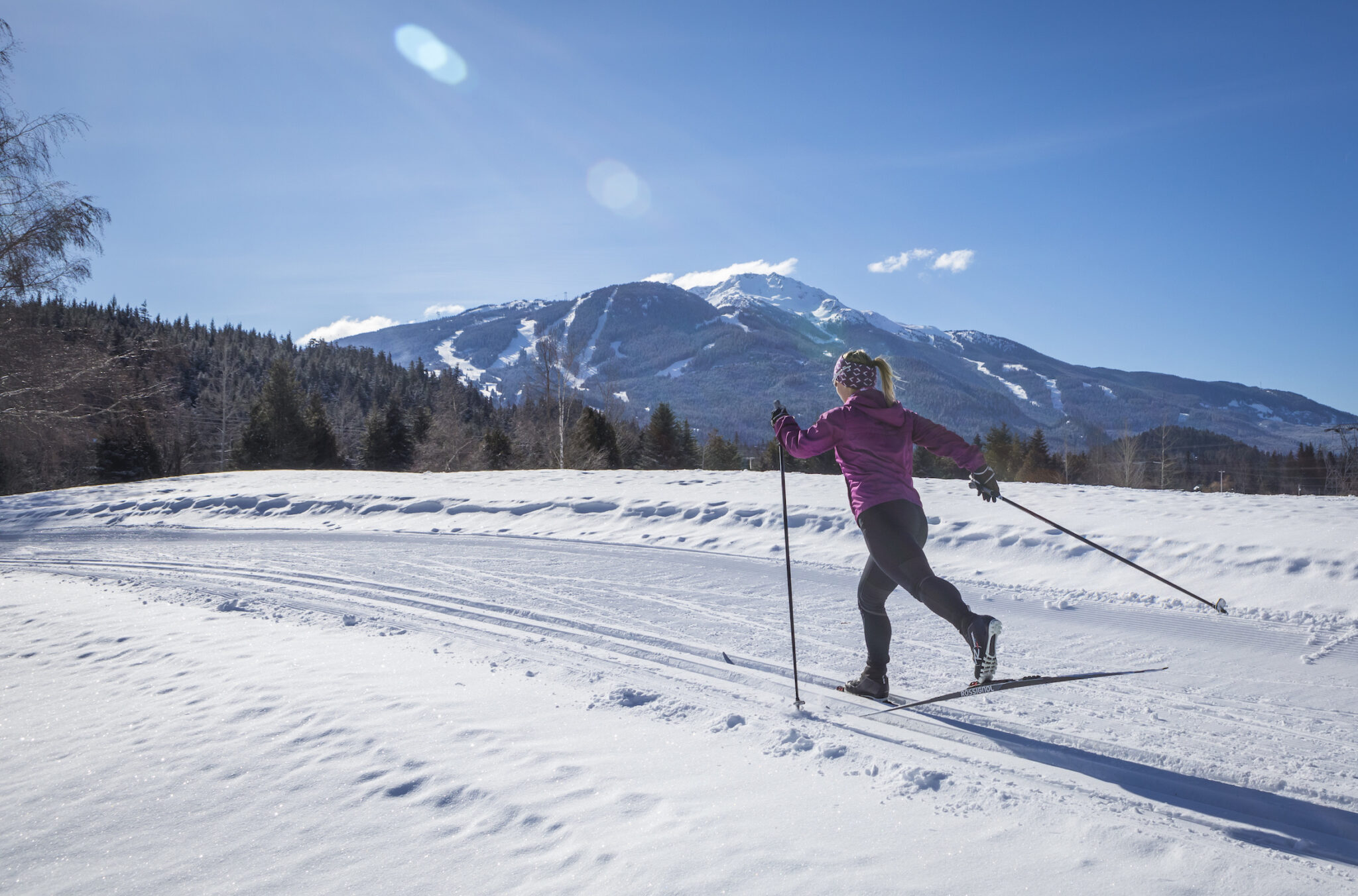 A cross country skiier enjoys the Lost Lake trails.