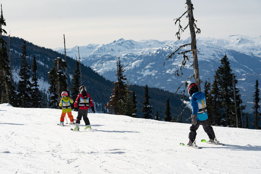 Children take ski lessons in Whistler.