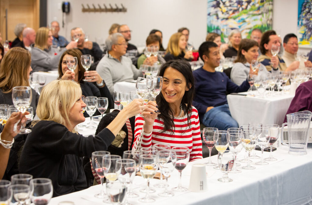 Wine glasses are all over the table at one of Cornucopia's wine tasting seminars.