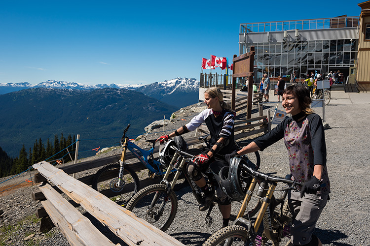 Two women chatting at Whistler Mountain Bike Park