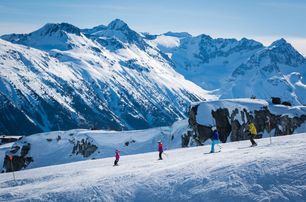 A group ski on Whistler Blackcomb with incredible views out over the Coast Mountains.