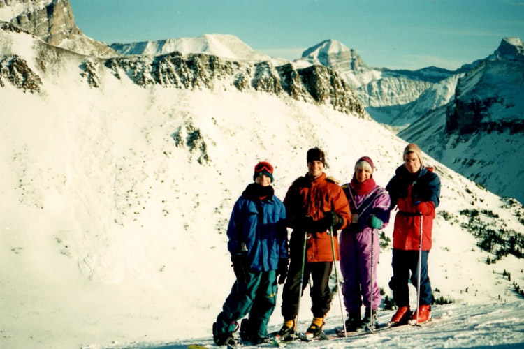 Family poses for photo on ski trip