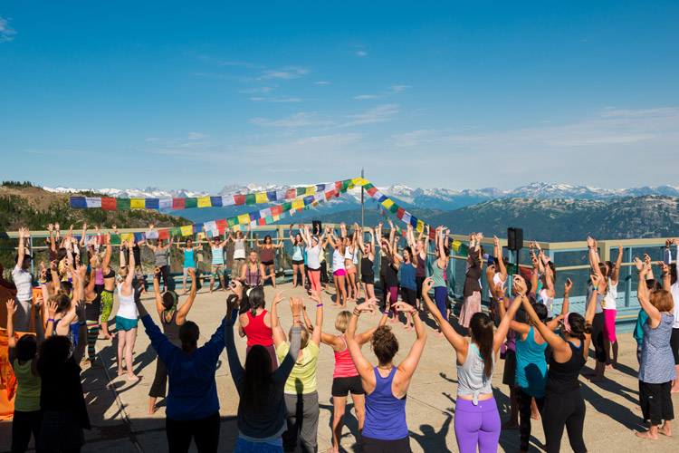 Mountain top yoga class in Whistler during Wanderlust