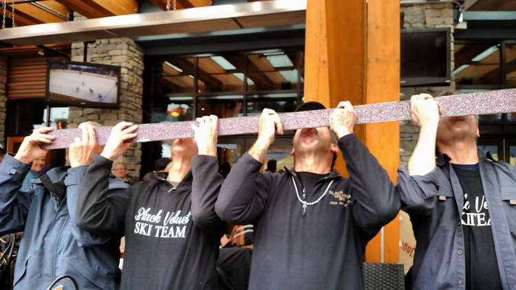 The Black Velvet Team using their shot ski and apres