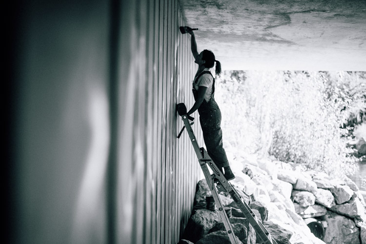 Artist Jessa Gilbert Painting the Creekside Underpass Mural