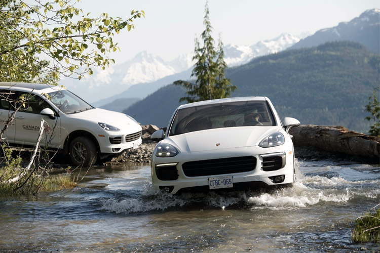 Porsche crossing a water feature in the Callaghan Valley