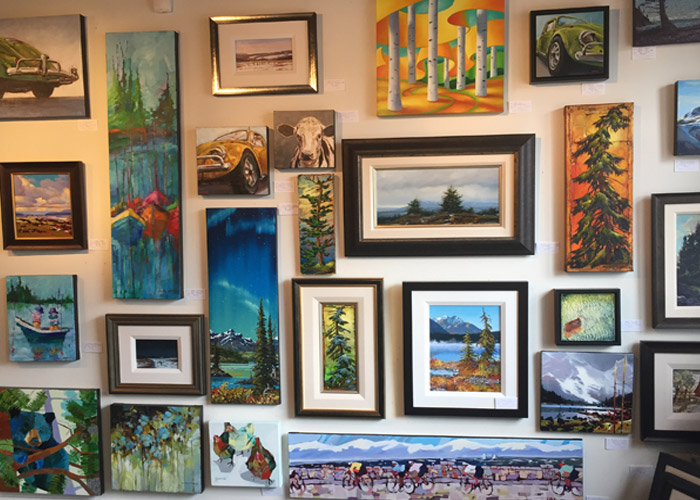 A wall of art at the Adele Campbell Fine Art Gallery