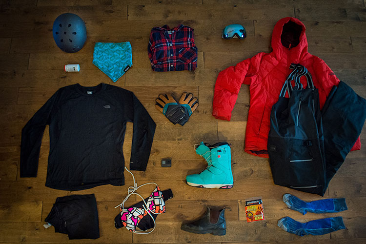Gear laid out from above for what essentials to pack for whistler.