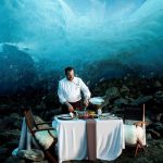 A chef prepares dinner in an ice cave during Whistler's Cornucopia festival.
