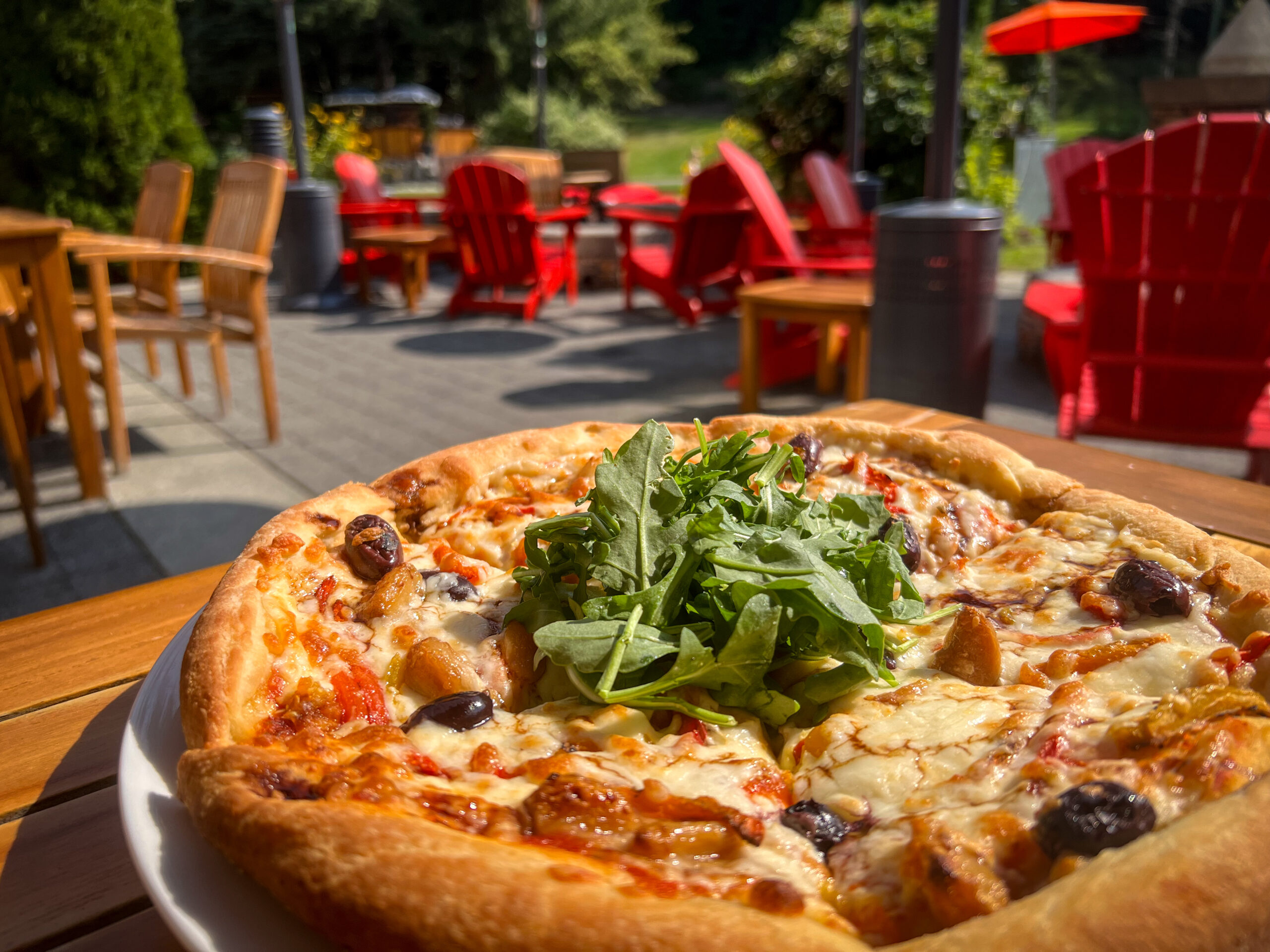 Pizza from the Mallard Lounge displayed on the patio.