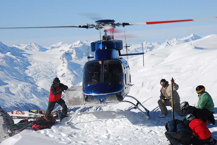 helicopter landing with guests about to get on