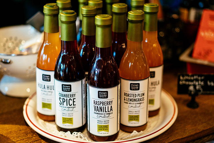 Bottles of Frost Bite Syrups on a plate.