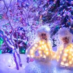 Festive characters pose under the lights in Whistler.