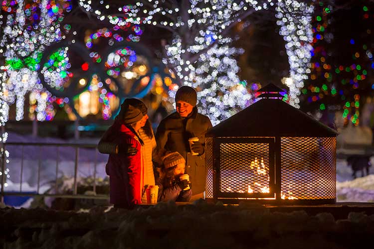 family warming by a fired-it