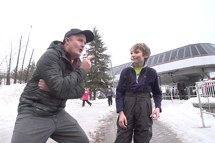 Brandon chats to a young man about why he came to Whistler.