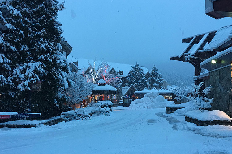 Thick snow on buildings in Whistler Village.