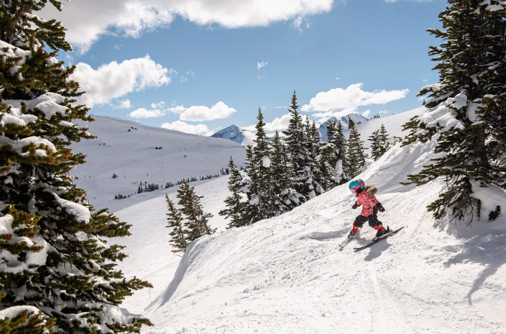 A child skier hits the slopes on Whistler Blackcomb.
