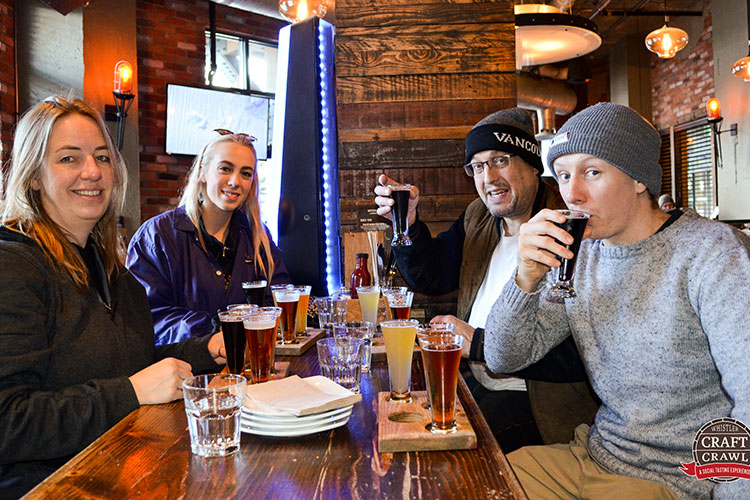 A group of friends sample beers at Brickworks in Whistler.