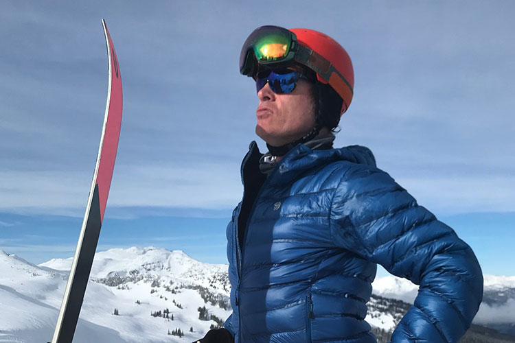 A skier pouts into the sunshine on Whistler Mountain.