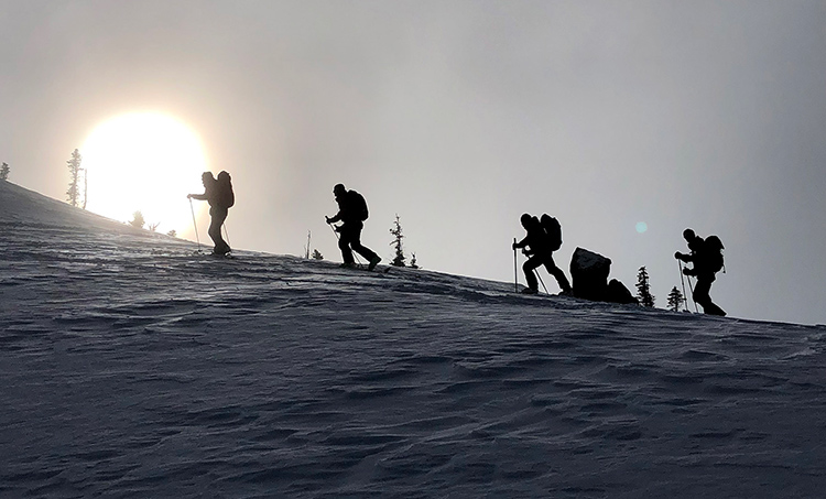 Ski tourers on the uphill climb in Whistler