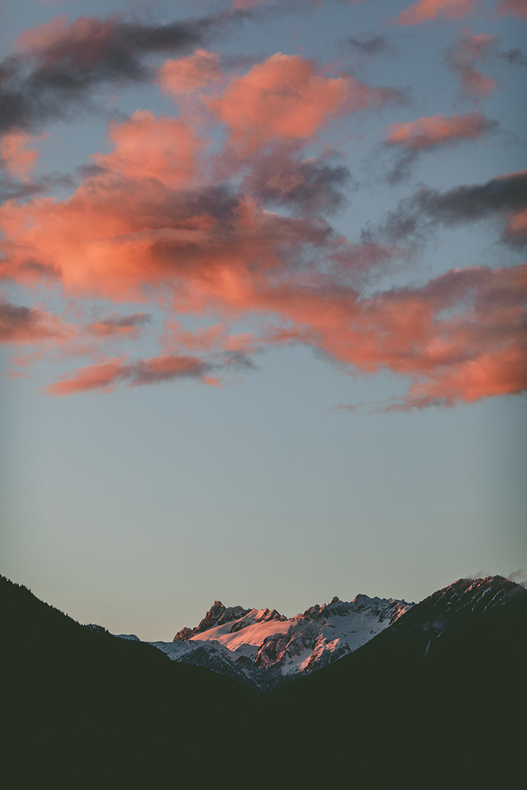 Alpenglow mountain peaks as the sun sets in Whistler