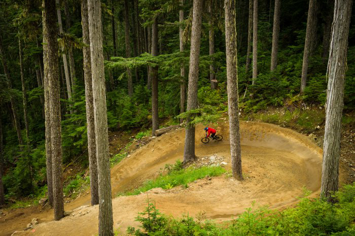 Mountain biker on a berm in the Whistler Bike Park