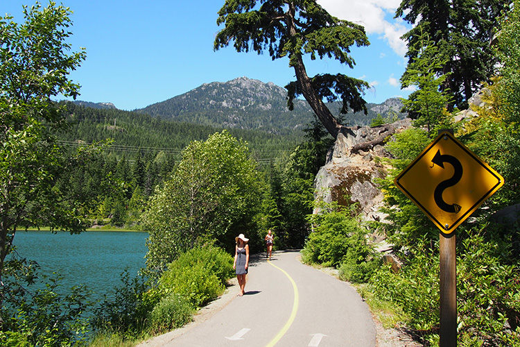 Woman walking the Valley Trail in Whistler