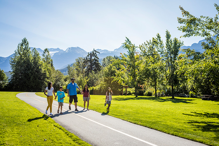 Family walking the Valley Trail in Whistler