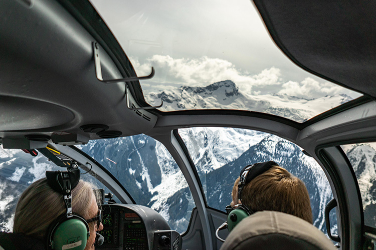 Mountain view from inside a helicopter in Whistler