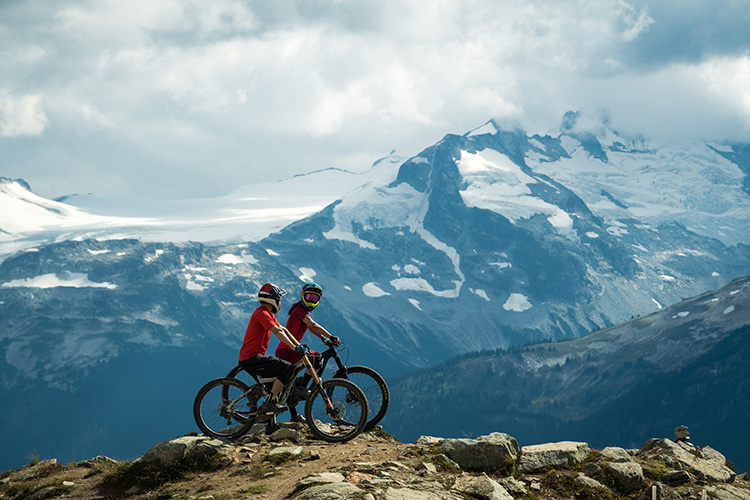Two mountain bikers on Top of the World trail in Whistler
