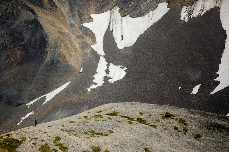 Hiker on a ridge near Black Tusk