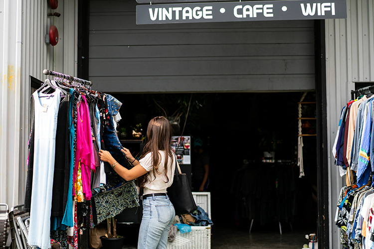 Shopper going through rack at The Velvet Underground in Whistler