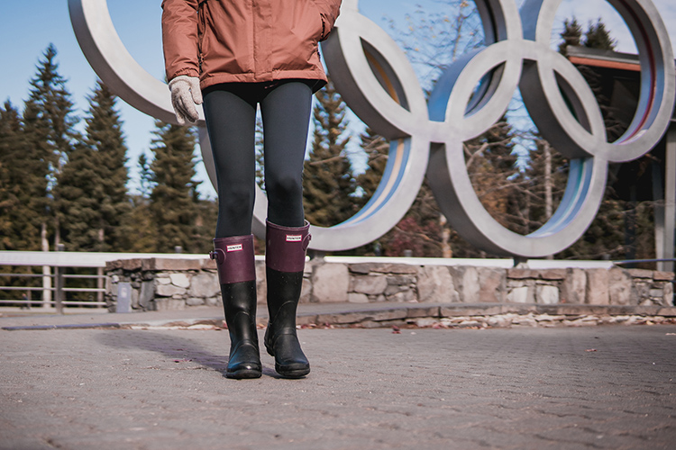 Woman wearing rain boots in Whistler