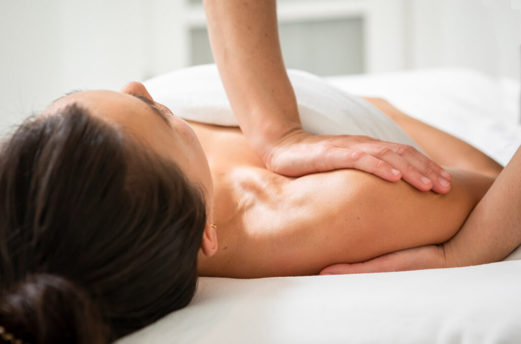 A person enjoys a massage at one of Whistler's spas.