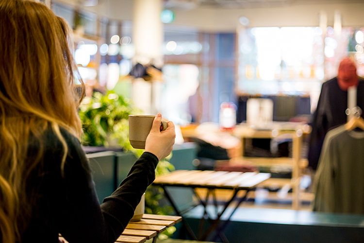 Person drinking coffee at ecologyst in Whistler