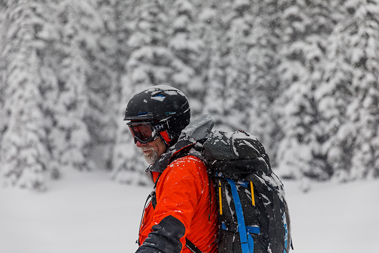 Extremely Canadian Guide in red jacket