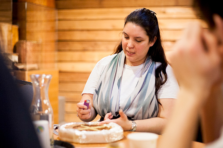 Instructor showing how to make a drum at the Squamish Lil'wat Cultural Centre