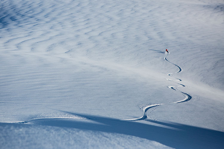 A skier gets fresh tracks with Whistler Heli-skiing