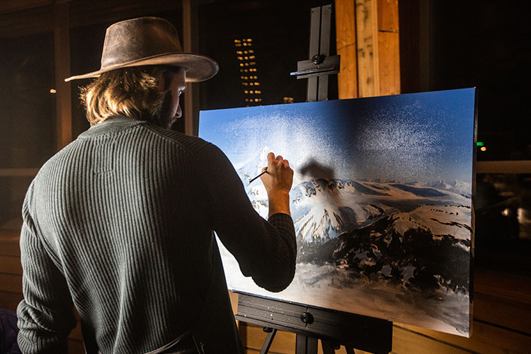 Artist Lucas Kratochwil paints in Whistler