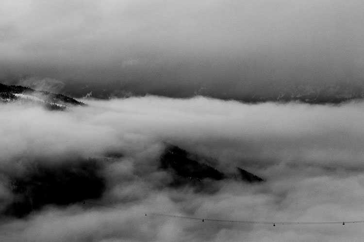 Storm clouds roll in over the mountains surrounding Whistler.