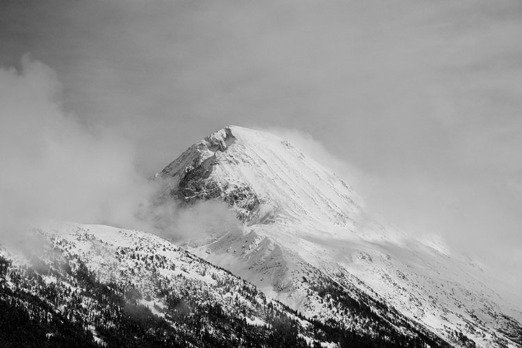 Storm clouds roll in over the mountains surrounding Whistler.