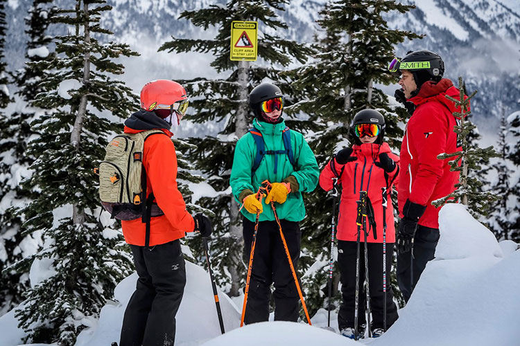 A mountain guide talks to teens on Whistler Blackcomb about safety in the backcountry.