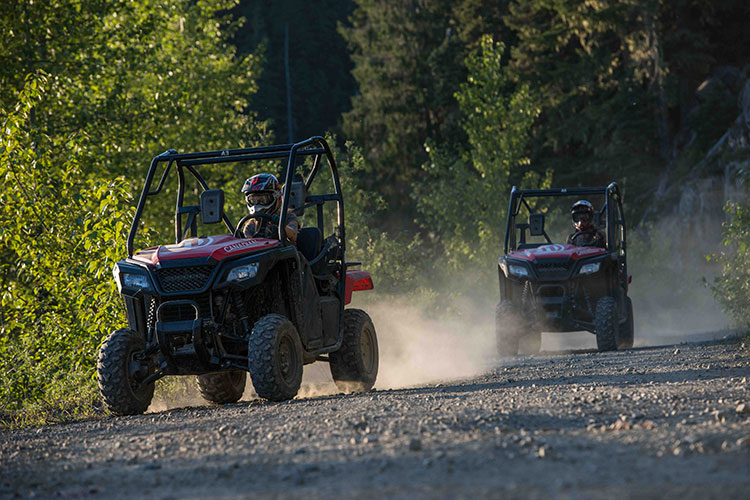 Two mountain buggies kick up dust in Whistler's Callaghan Valley.