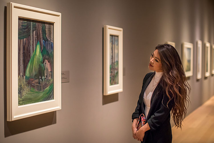 A woman looks at the art on the walls of the Audain Art Museum in Whistler.