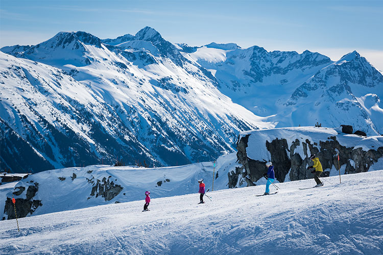 Family skiing in a ridge