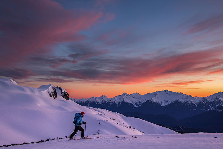 A cross country skier in the high alpine in Whistler.