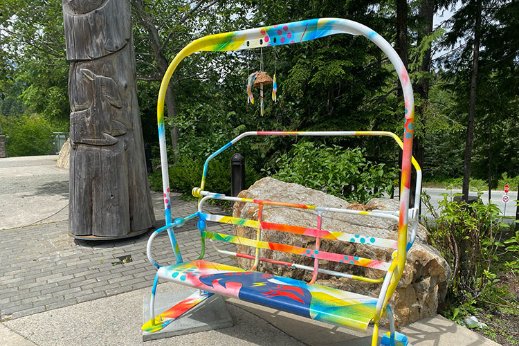 An old Catskinner chair lift from Whistler Blackcomb given a revamp by a local artist.